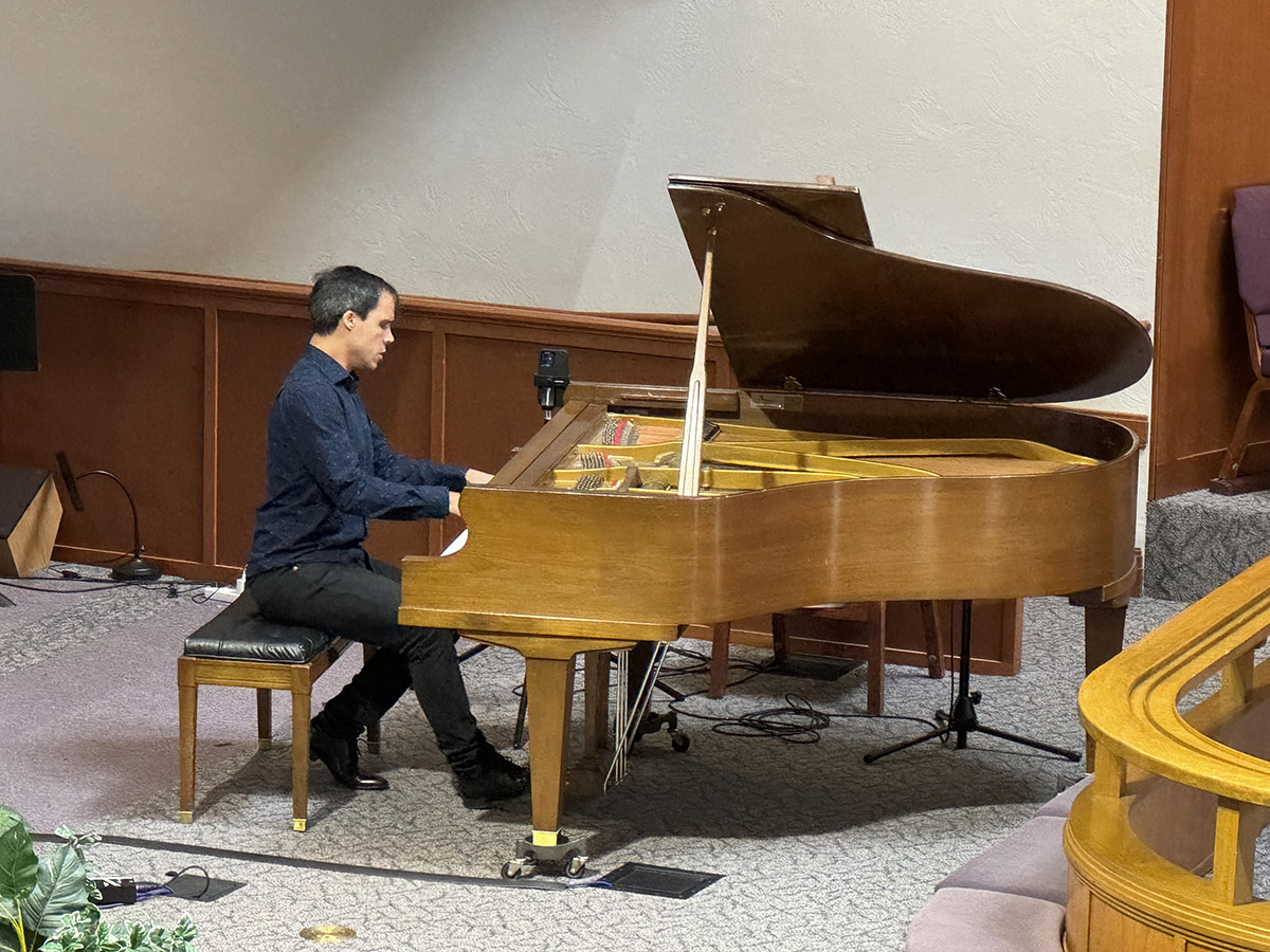 man playing piano